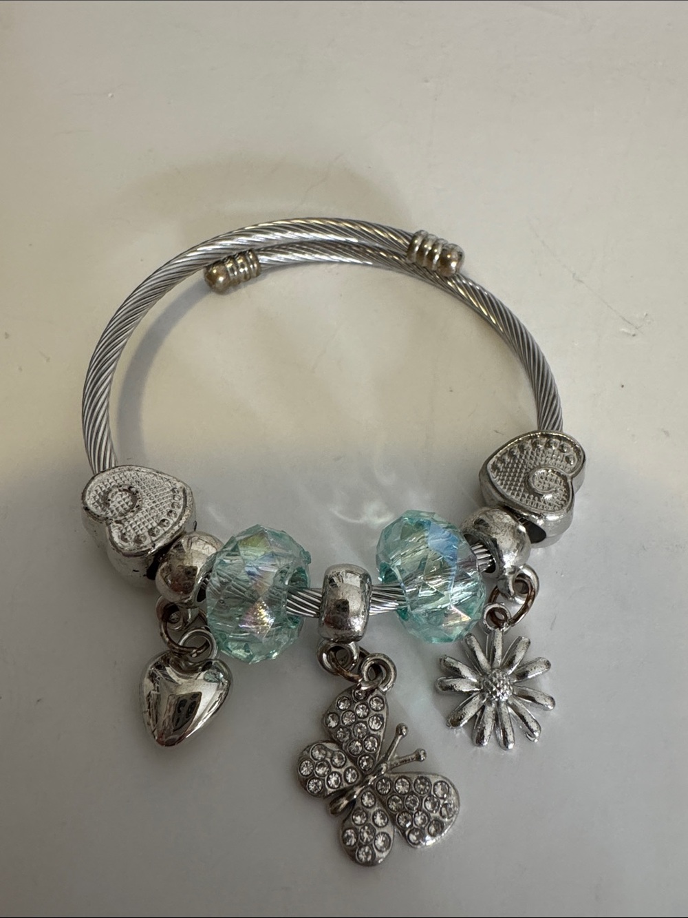 Silver Charm Bracelet with Iridescent Aqua Beads and Butterfly Charm